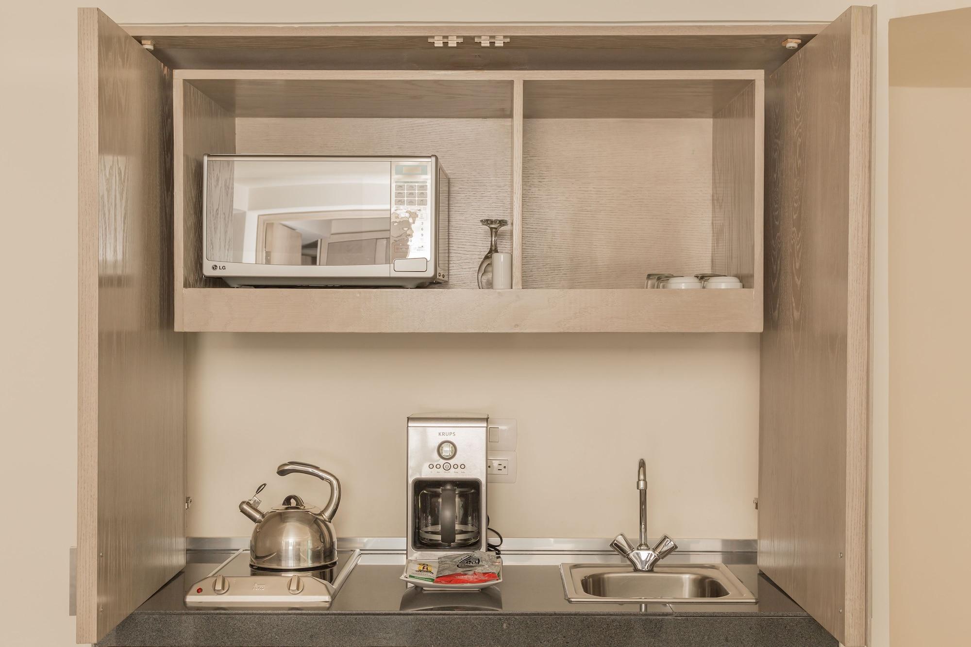 Suites Contempo Mexiko-Stadt Exterior foto A typical kitchenette