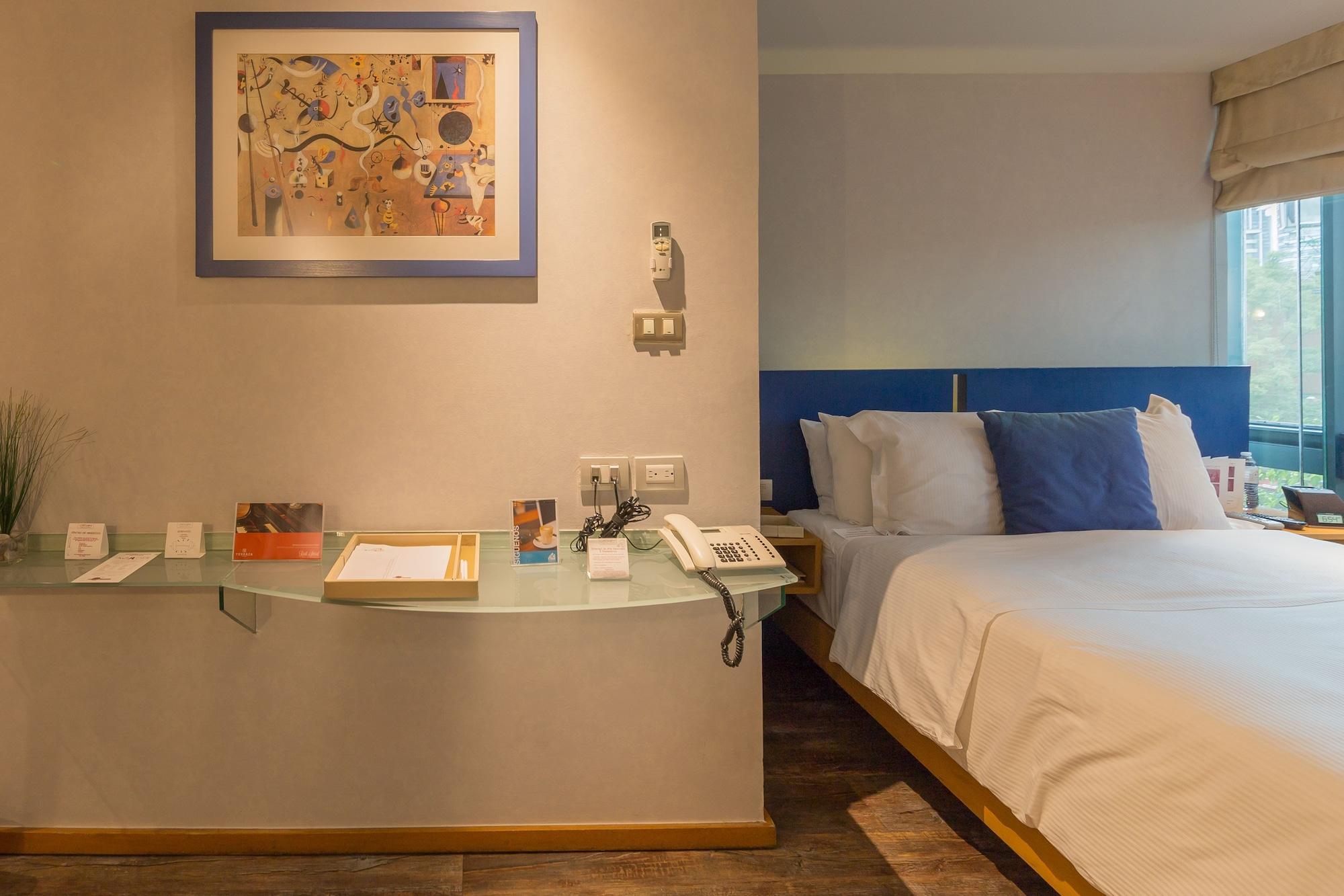Suites Contempo Mexiko-Stadt Exterior foto A room at the hotel