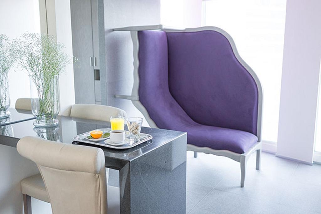Suites Contempo Mexiko-Stadt Exterior foto The "L" shaped chair