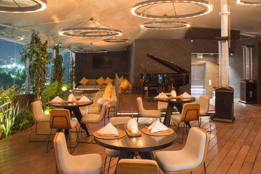 Suites Contempo Mexiko-Stadt Exterior foto The interior of the restaurant
