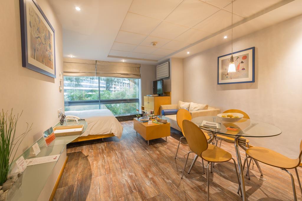 Suites Contempo Mexiko-Stadt Exterior foto A typical studio apartment in Singapore